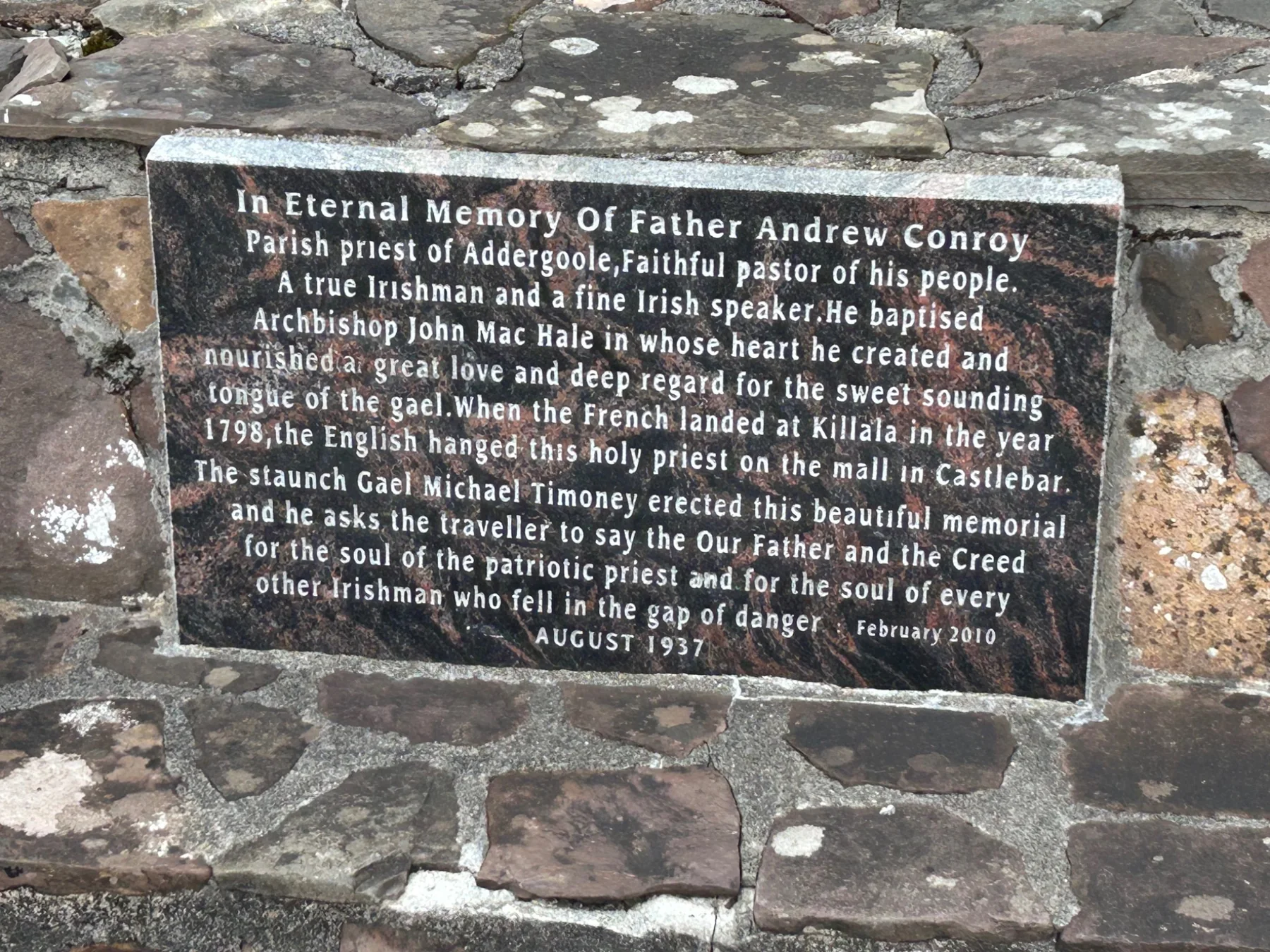 English-language plaque describing Father Andrew Conroy and his connection to John MacHale