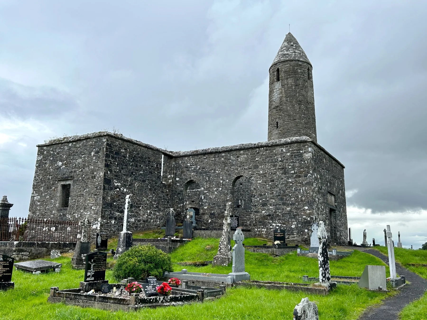 Turlough Round Tower and church ruins in County Mayo